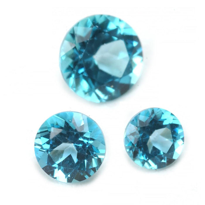 Closeout-Round Swarovski Gemstones™ Genuine Ice Blue Topaz - Otto Frei